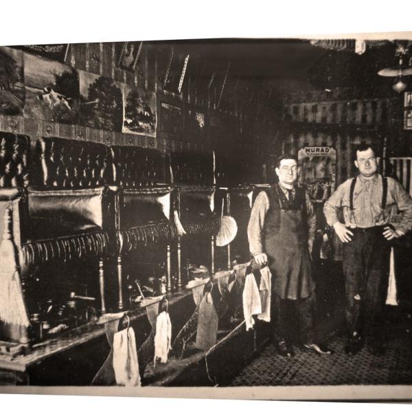 Joseph, left, and brother Isacc inside an early iteration of Angel's Shoe Repair