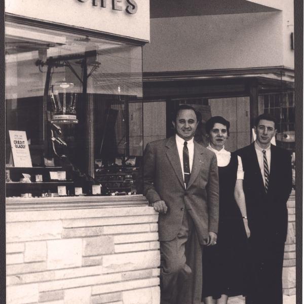 Ike Ovadia, left, outside his jewelry store, 1950s or 60s