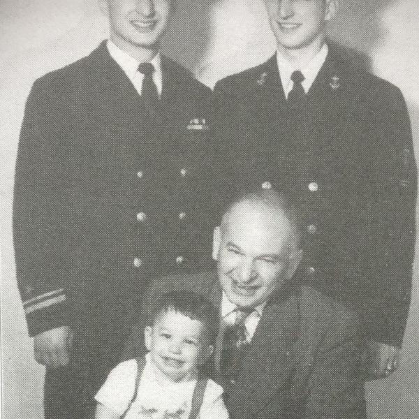 Three generations of the Bridge family. From left: Herb and Bob Bridge (in uniform), with Ben Bridge holding grandson Jon Bridge. Image courtesy Bridge Family.