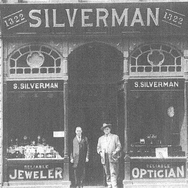 Sam Silverman and friend outside of the Silverman store. Image courtesy Bridge family. 
