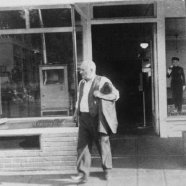 Abe Brenner, founder of Brenner's Bakery, probably at store, 1803 Yesler Way, Seattle, n.d.