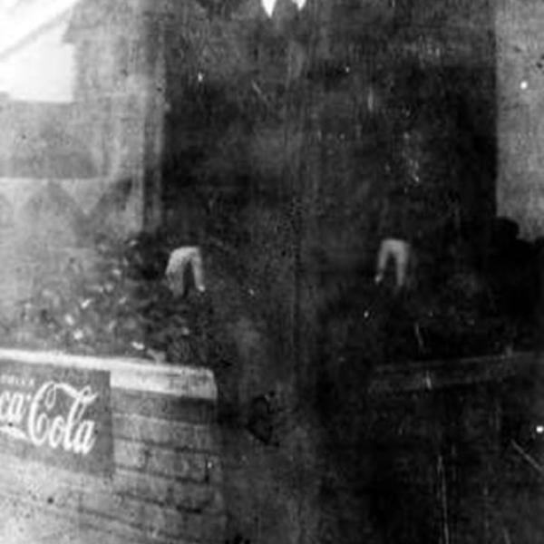 Itsey Brenner standing in front of store