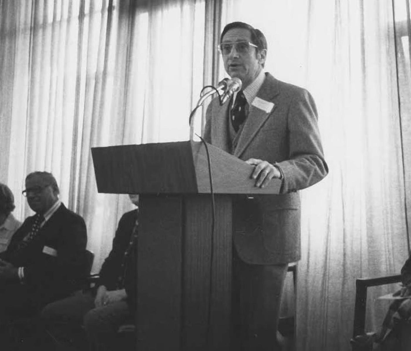 Robert Block, Chairman of the Board of Carolyn Kline-Galland Home, speaking at an annual meeting between 1980 and 1985 