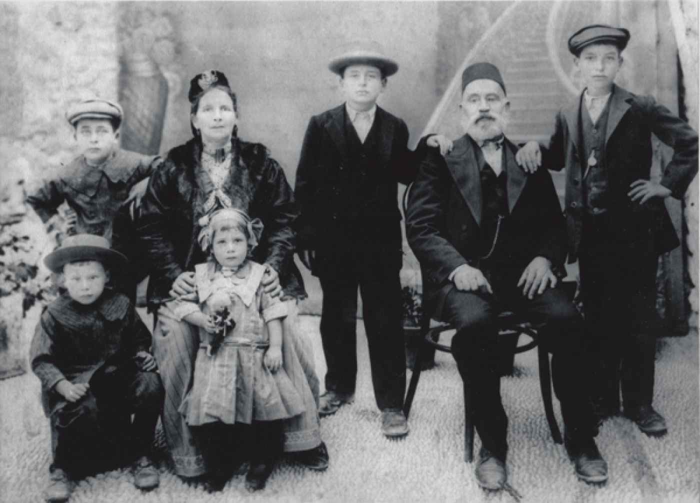 Israel family portrait, in Rhodes, 1915. Left to right: back row: Nissim, Sarah , Sam, Isaac, Morris; front row: John, Bona