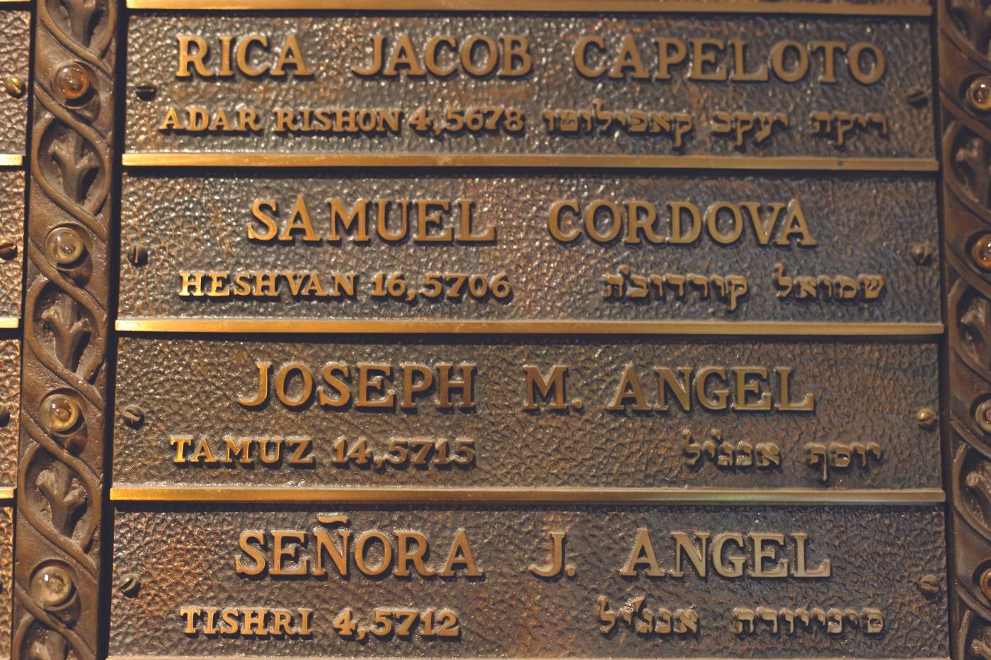 Bronze plaques are placed on the inside walls of both synagogues to memorialize community members who have passed on.