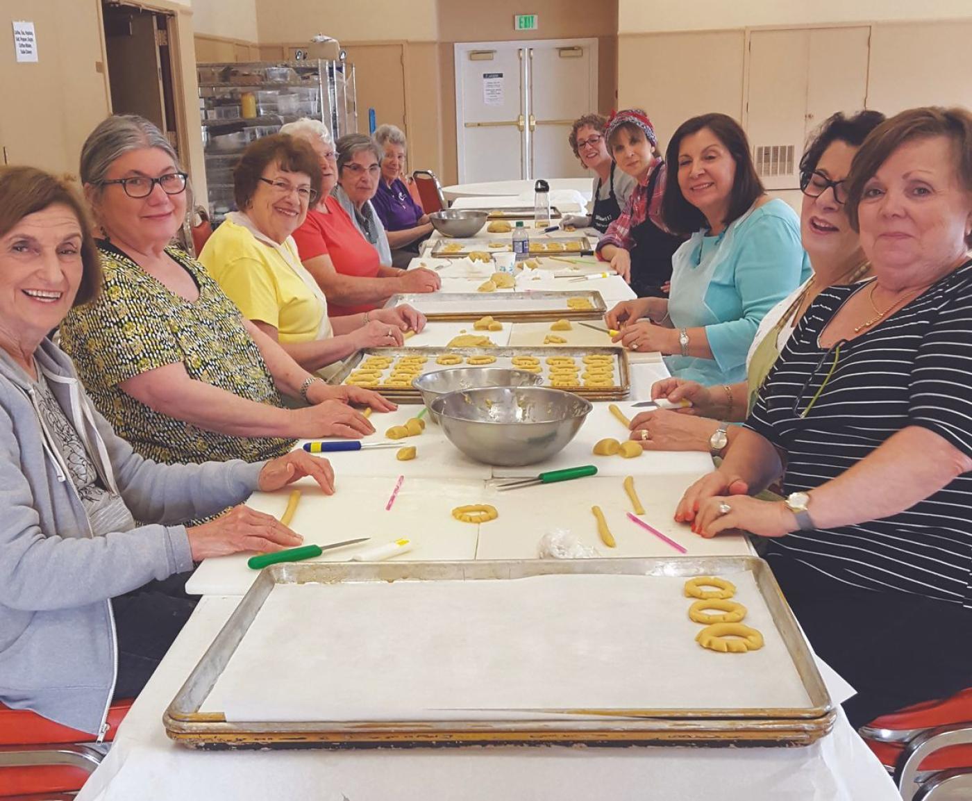 Women from the community make biscochos, a braided sweet cookie topped with sesame seeds.  Photo Courtesy Seattle Sephardic Network