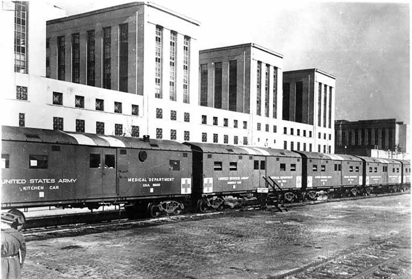 Seattle Jewish Community Hospital train, approximately 1943-1944. Workmen's Circle in conjunction with several Jewish agencies, purchased two trains of thirteen cars that were loaded with medical supplies and amenities for troops as part of their operations to support the war effort. Courtesy UW Special Collections.