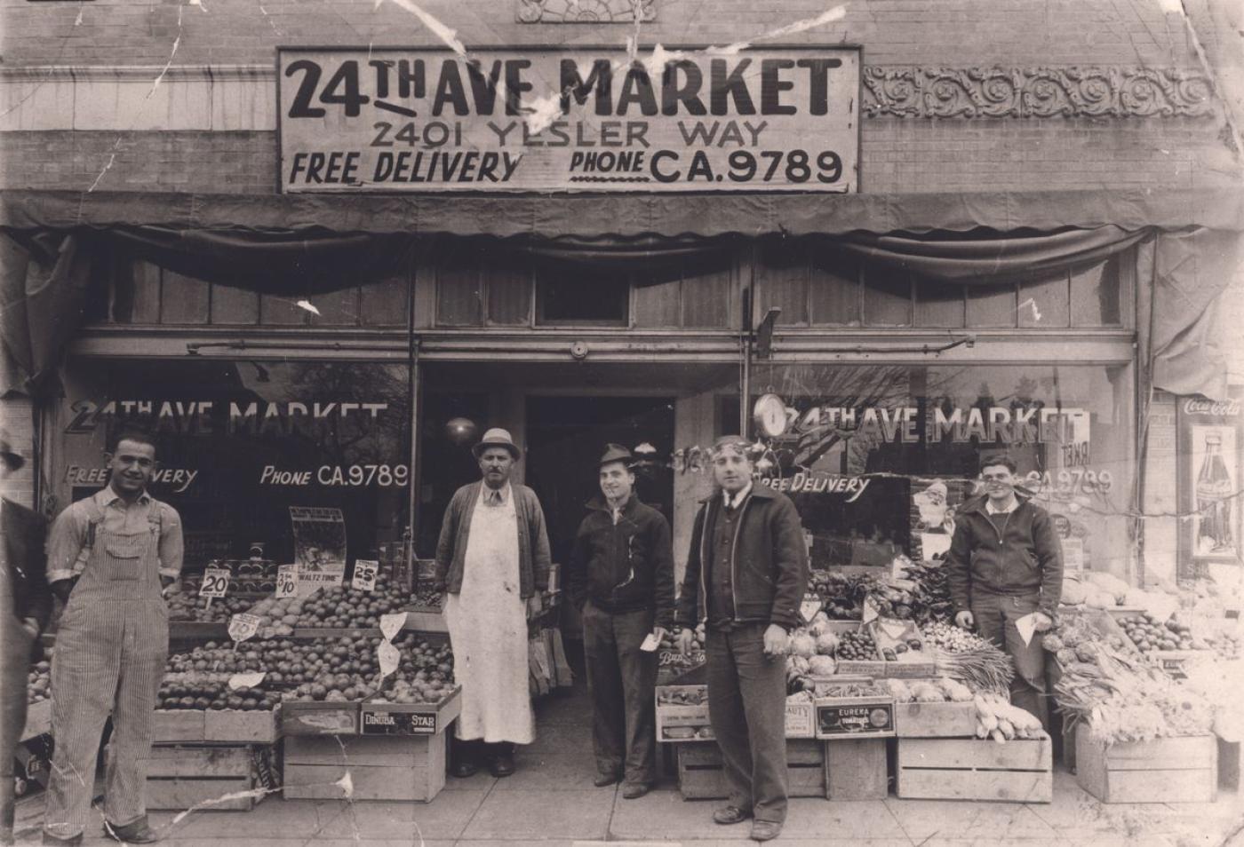 In 1902, Solomon Calvo, left, was one of the first two Sephardic Jews ever to step foot in Seattle. He operated Waterfront Fish & Oyster, which supplied product to some of the earliest fishmongers at Pike Place Market. (1914) Photo Courtesy: University of Washington Libraries, Special Collections, UW1092