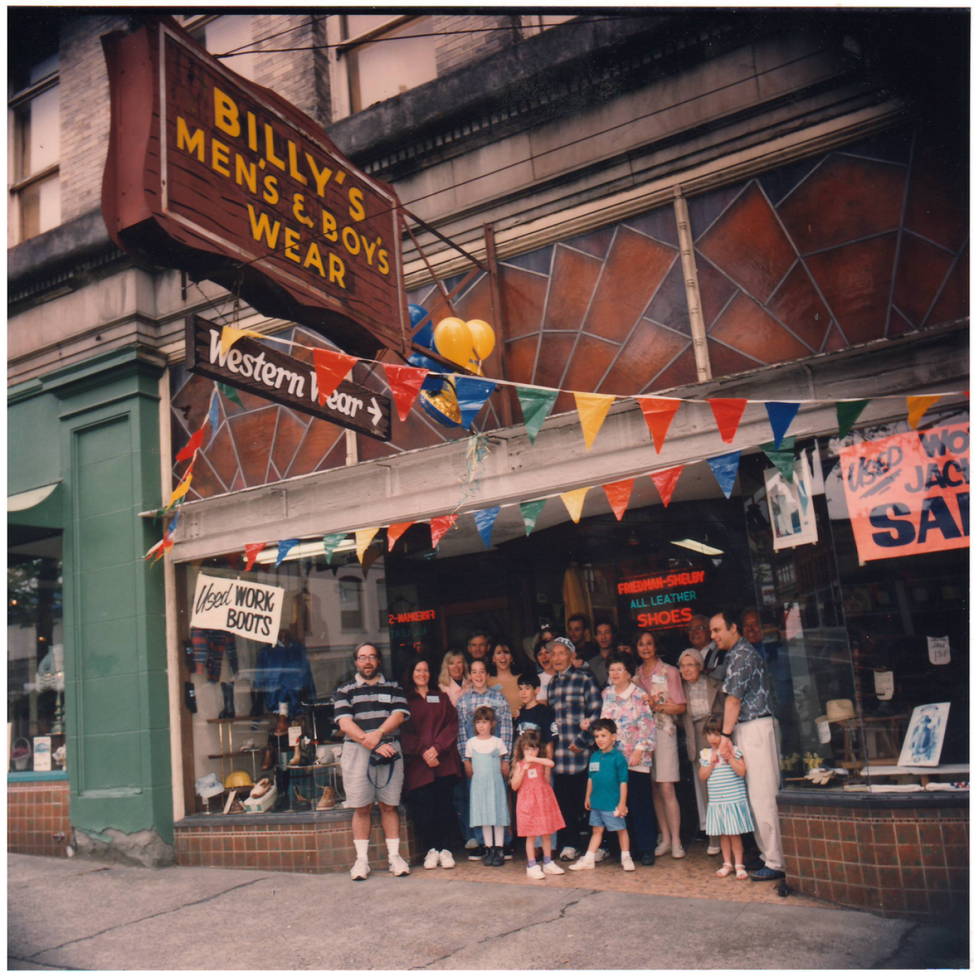 Billy Sturman's extended family outside store.png
