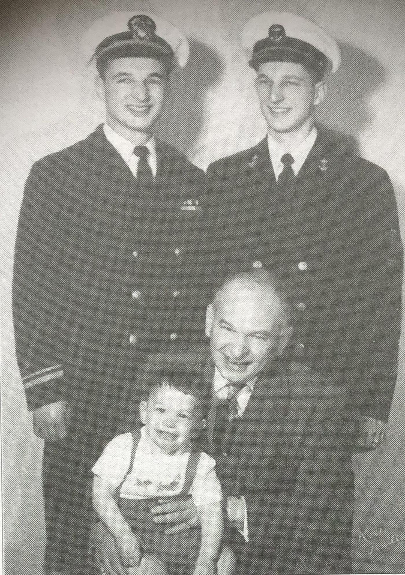 Three generations of the Bridge family. From left: Herb and Bob Bridge (in uniform), with Ben Bridge holding grandson Jon Bridge. Image courtesy Bridge Family.