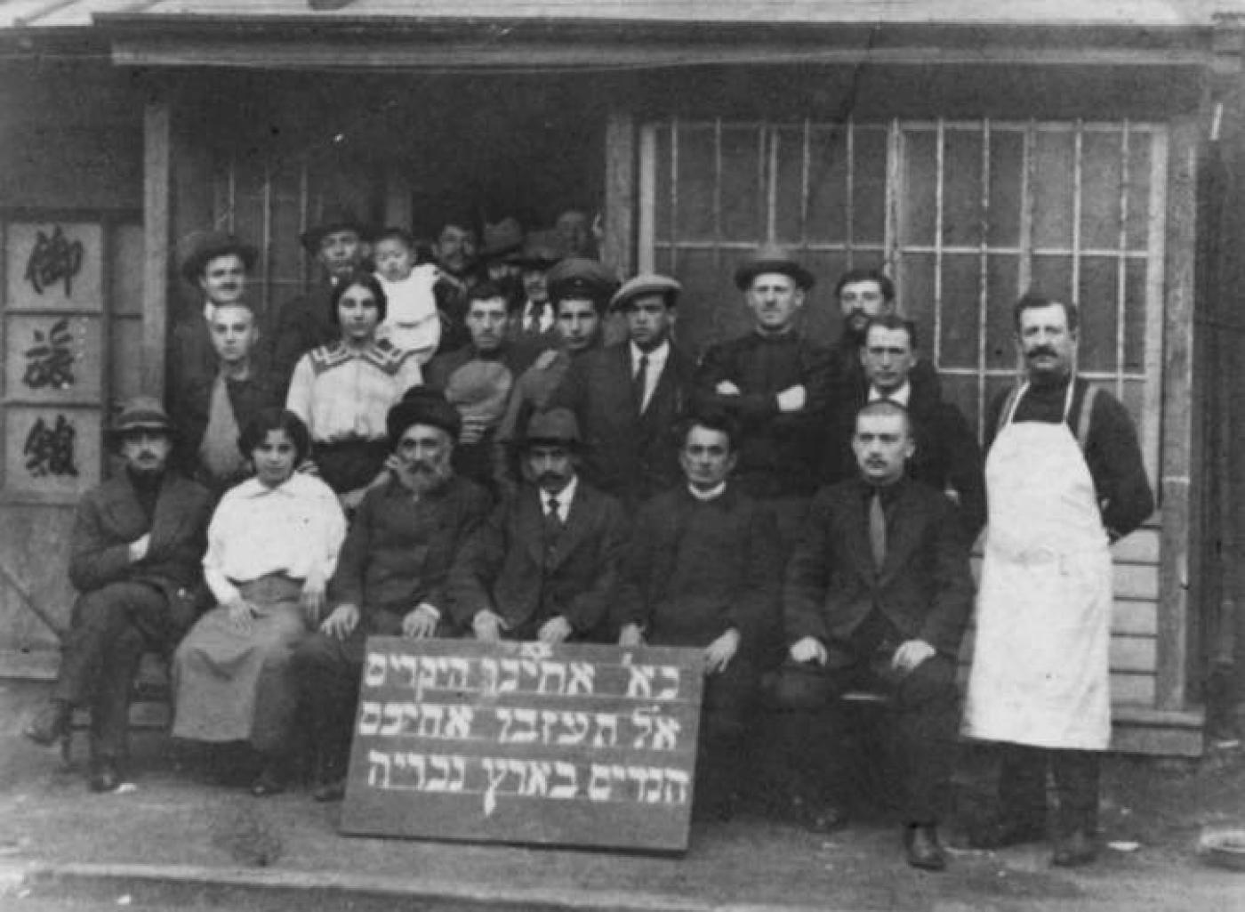 Aaron Dubson (far left, seated) with a Zionist group in Harbin, China, approximately 1913.jpg