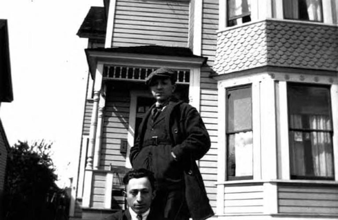 Abe Hoffman and Al Hoffman on street at 18th Ave. and Yesler Way, Seattle.jpg