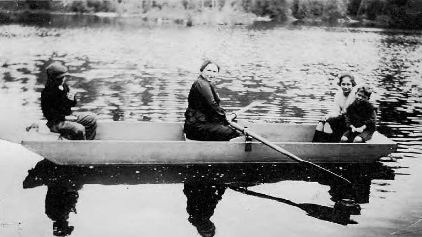 Celia Kaplan and three children, probably Joseph, Ethel and Philip Kaplan, in a rowboat