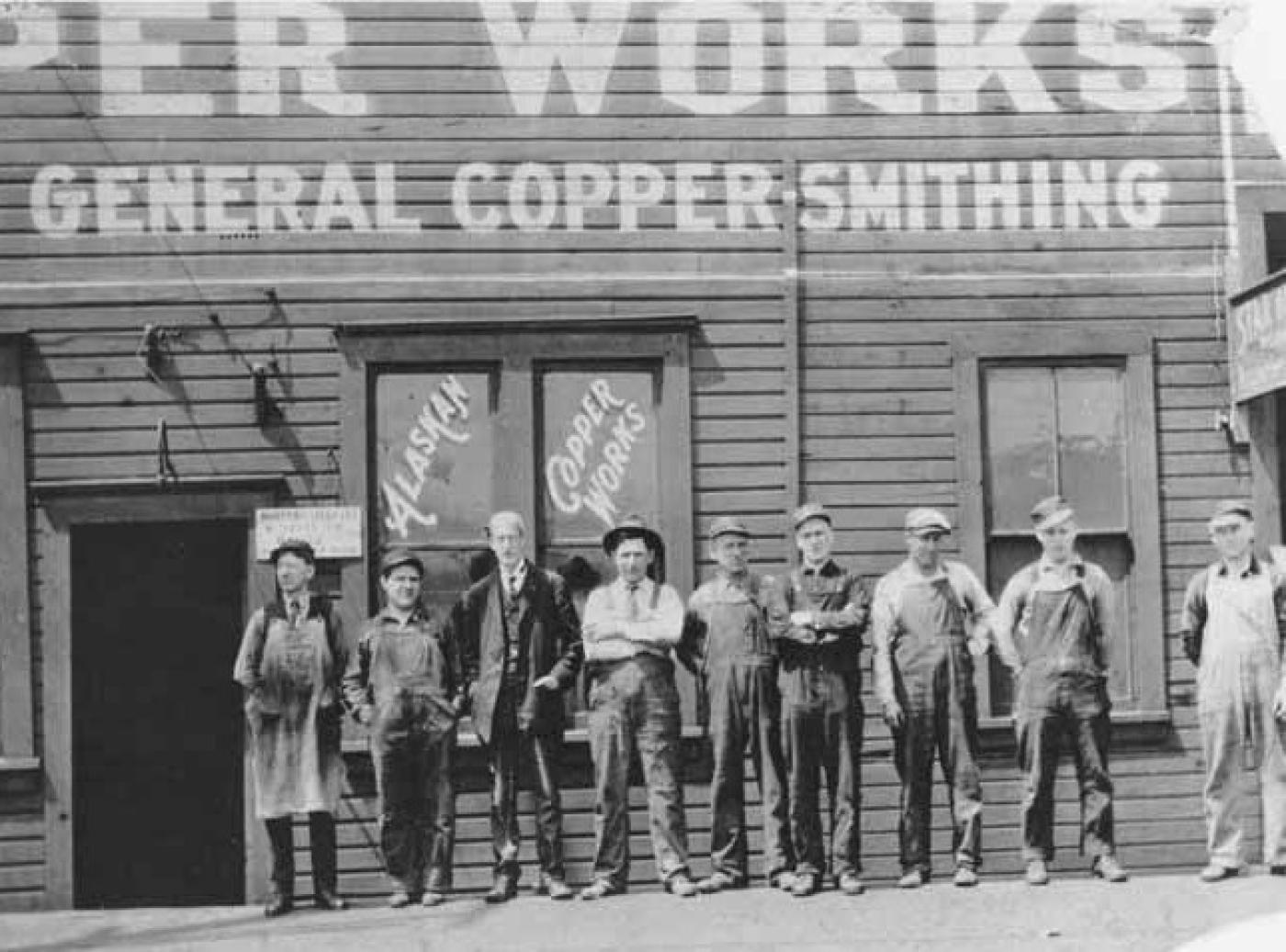 Alaskan Copper Works crew in front of Alaskan Copper Works building, Seattle, Washington, approximately 1918