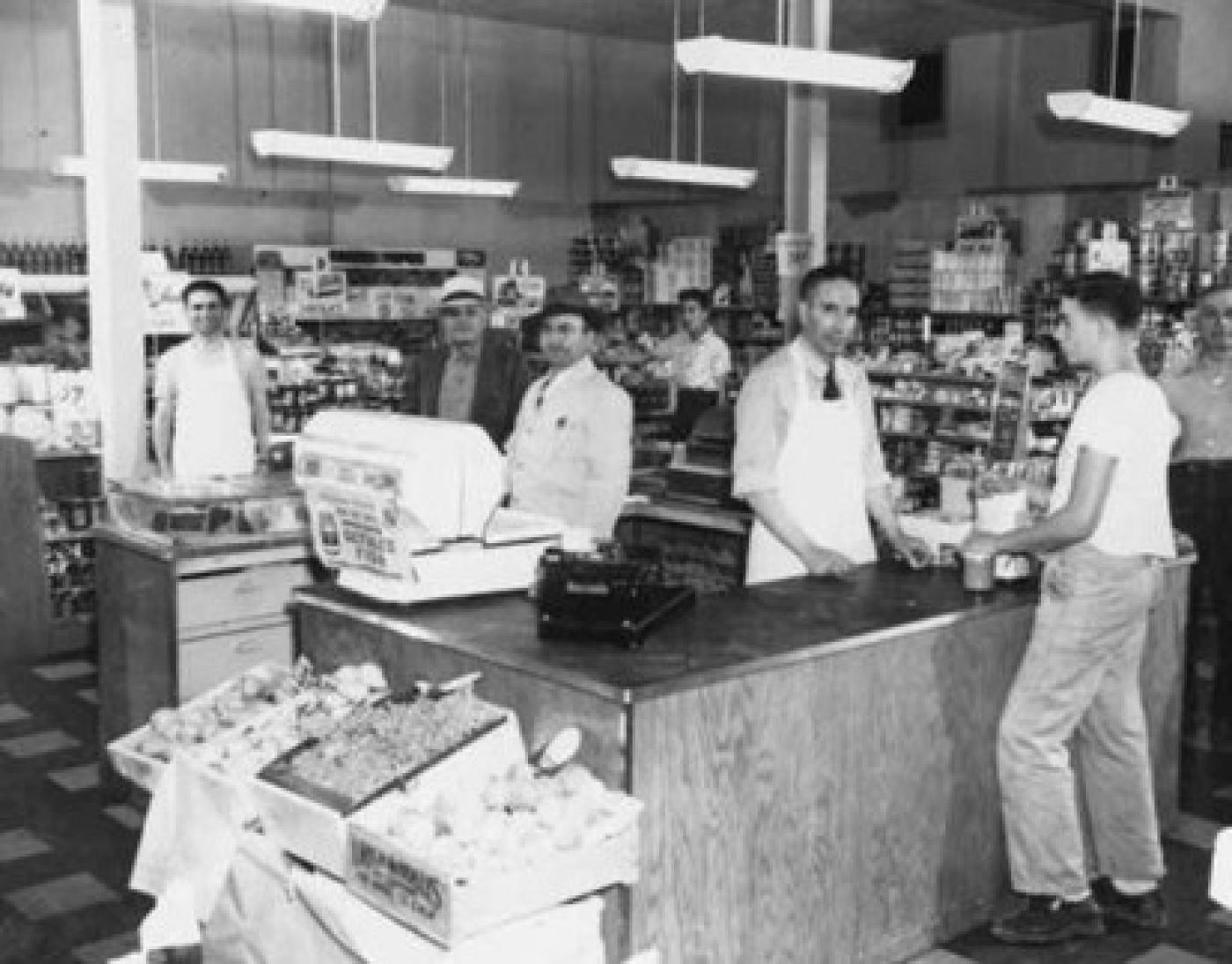 (from left) owners Sam and Isaac Maimon, Rachel Habib and Al Azose 24th Avenue Market interior with owners Isaac (left) and Sam (3rd from left) Maimon and employees