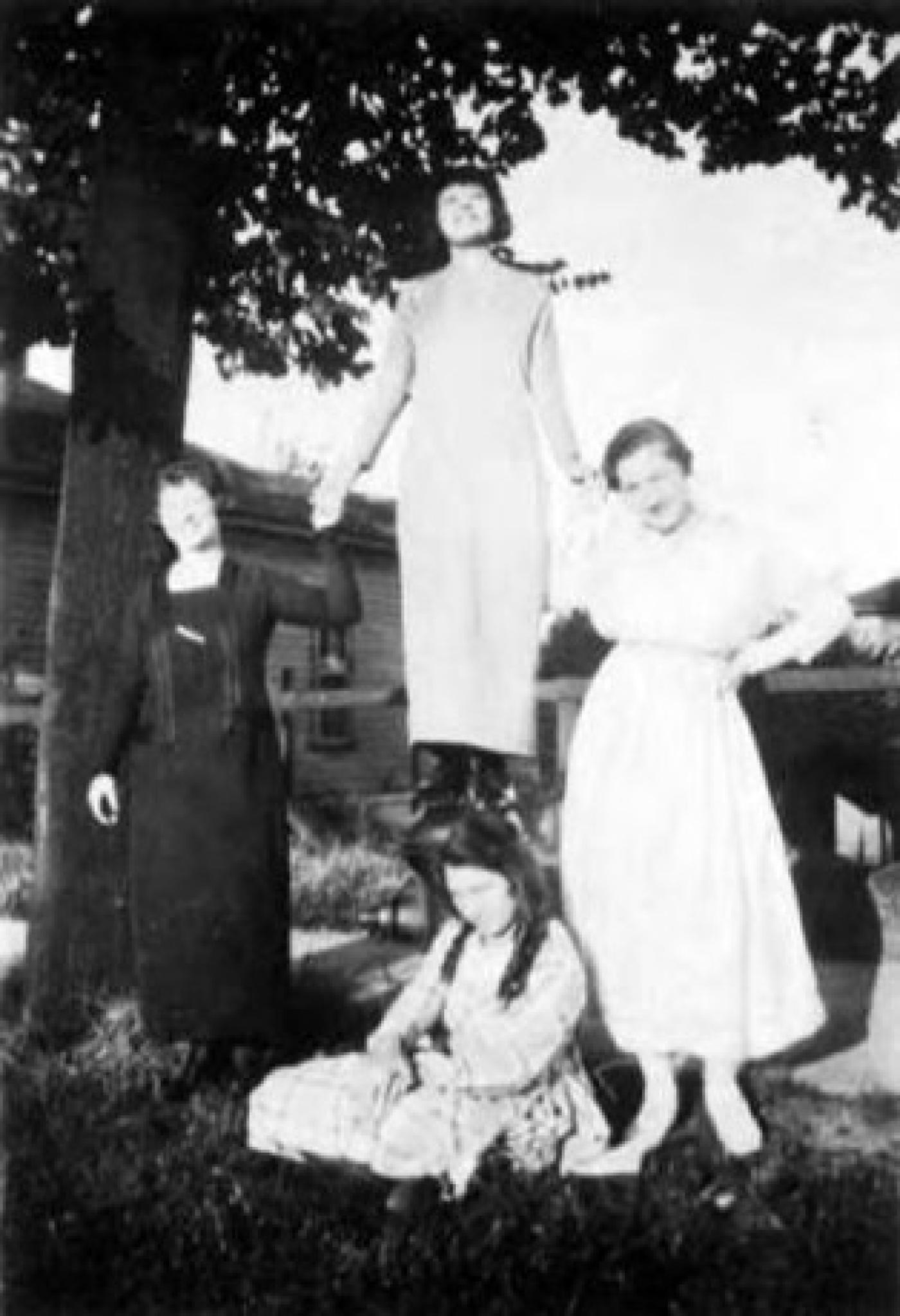 Group of people outside of Mosler apartment, 1217 Yesler Way, May 1917