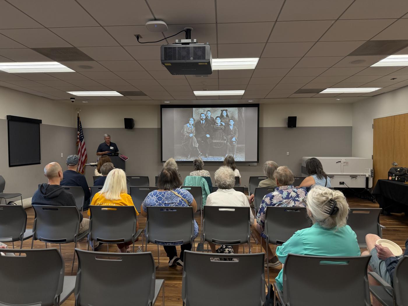 Audience listening to presentation 1