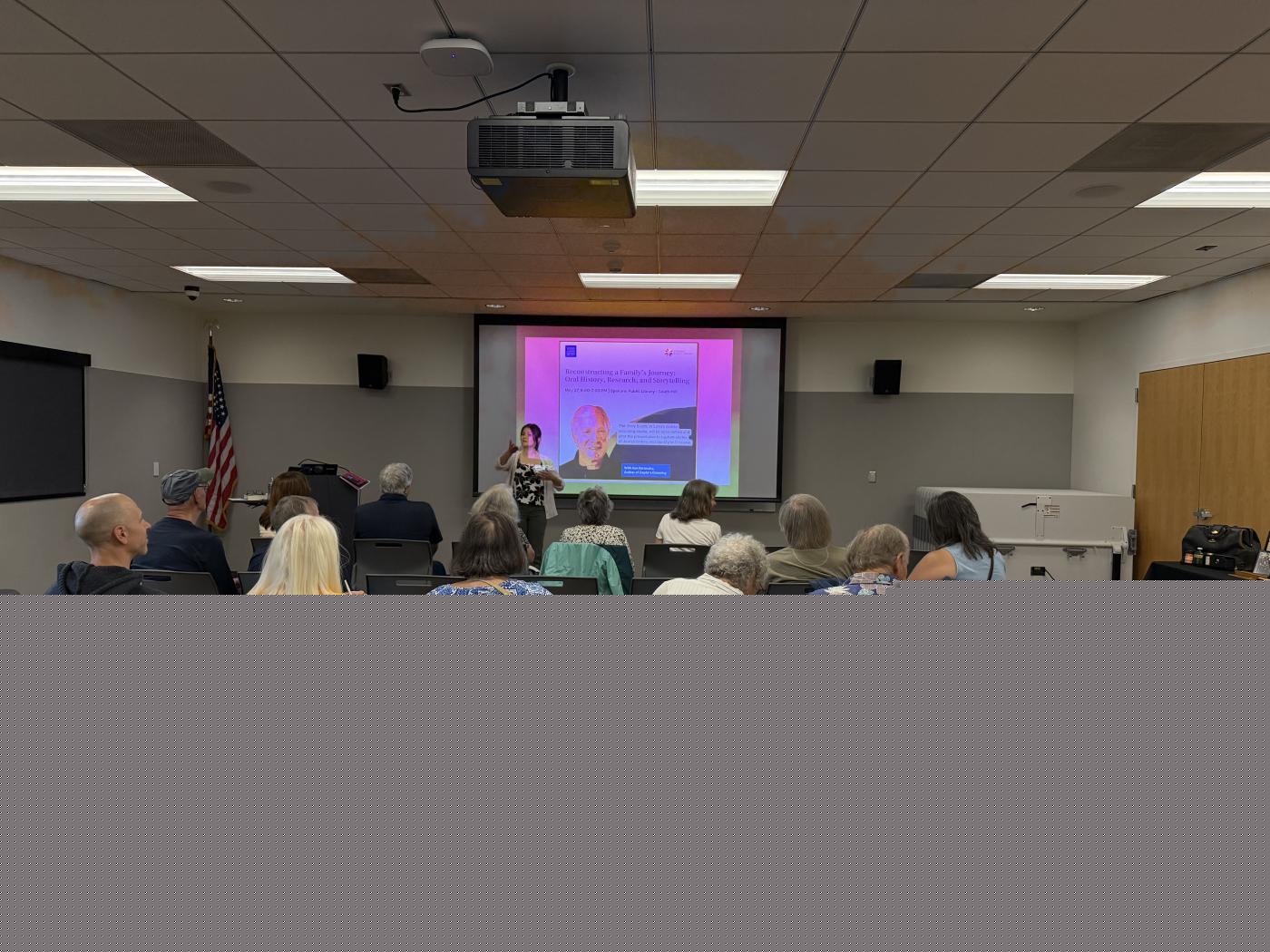WSJHS Director Hannah Peters speaking at the presentation
