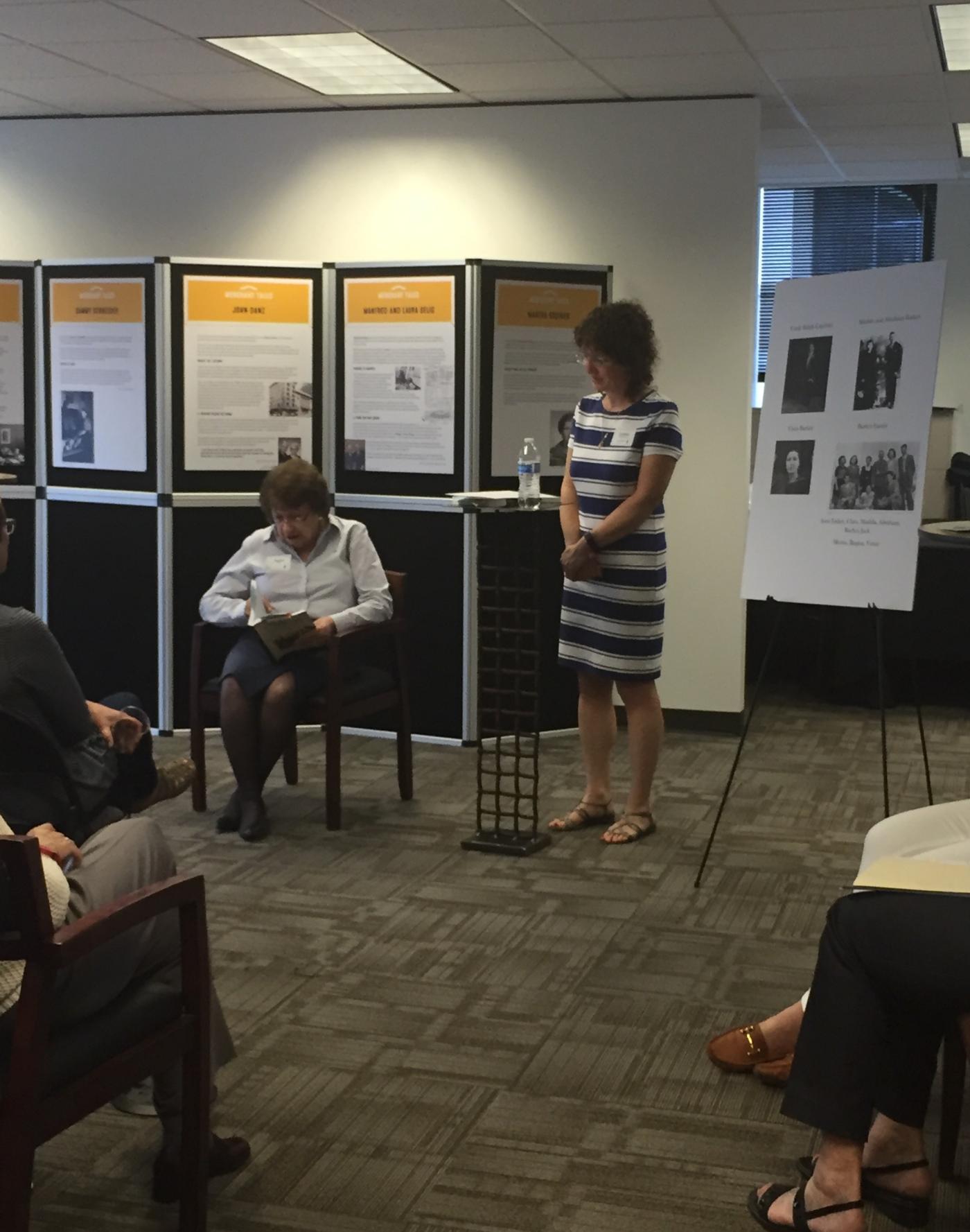 Regina Amira is speaking at the event