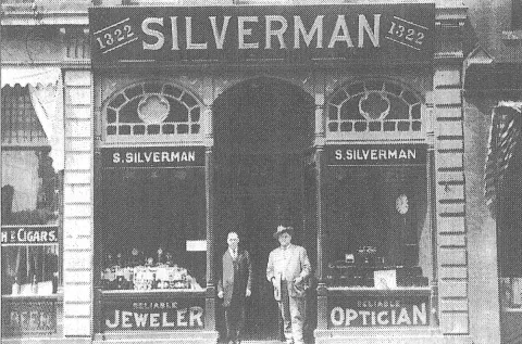 Sam Silverman and friend outside of the Silverman store. Image courtesy Bridge family. 