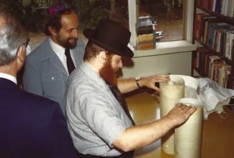 Ed (center) presenting the Sefer Torah at Congregation Beth Shalom, August 8, 1976.
